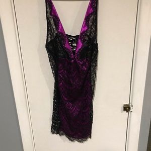 Black lace overlay over purple shell lace up back